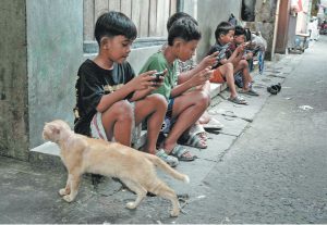 Indonesian kids fear losing learning, joy under social media ban